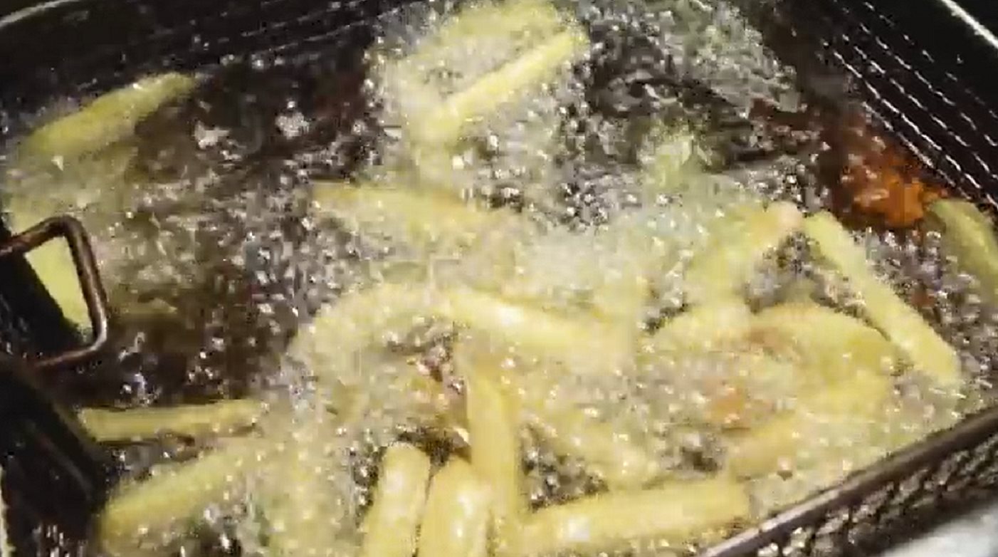 fries frying in oil