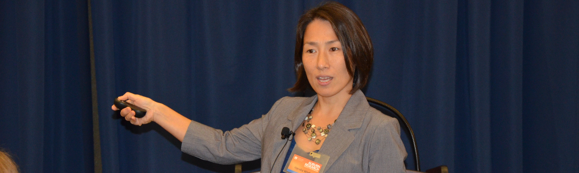 presenter speaking at symposium