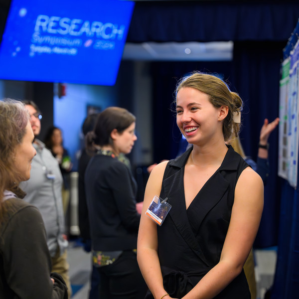 researcher at symposium
