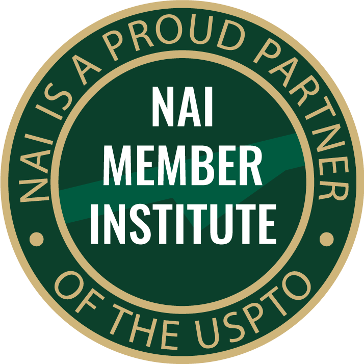 Circular image with gold and white lettering on a green background. National Academy of Inventors Member Institution Badge. NAI is a proud partner of the USPTO. NAI Member Institute.